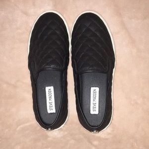 Black quilted loafers